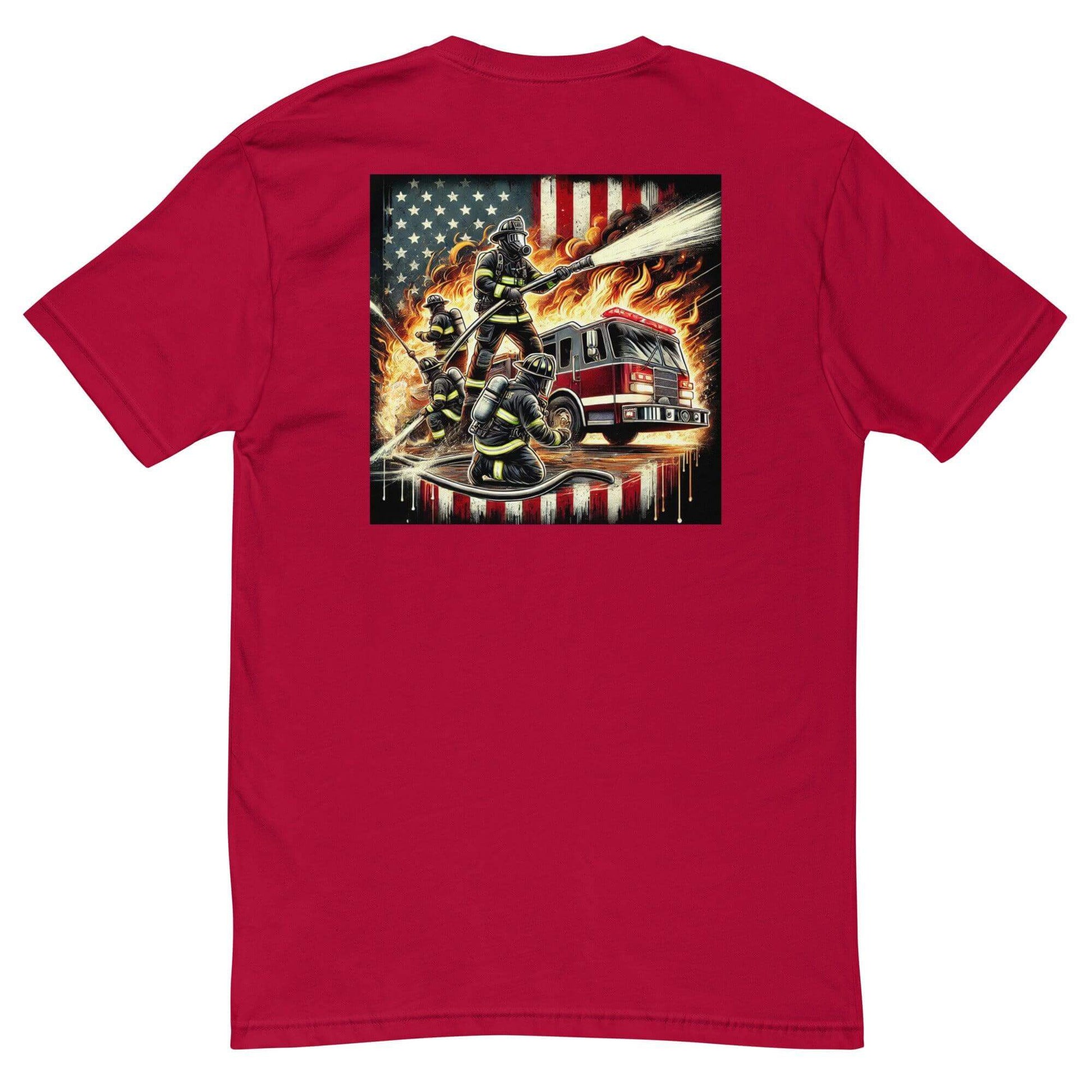 Red short sleeve t-shirt featuring firefighters battling flames with an American flag background, perfect for firefighter apparel.