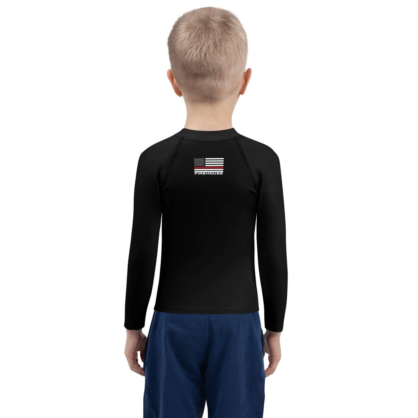 Back view of a child wearing a black kids rash guard with firefighter-themed design, perfect for sun protection and active play.