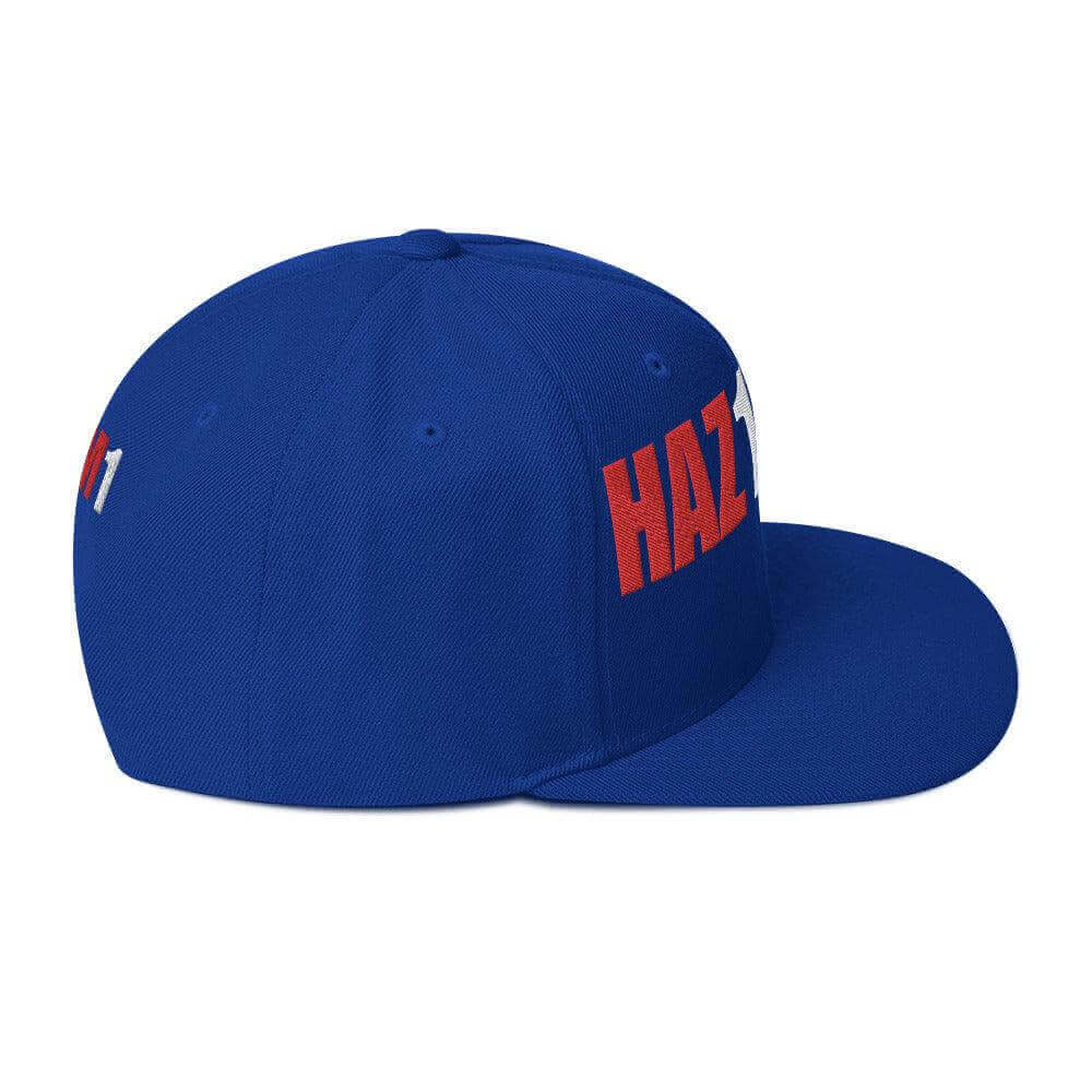 Blue snapback hat with "HAZ 1" embroidery, structured fit, adjustable snap closure, perfect for firefighter apparel and gifts.