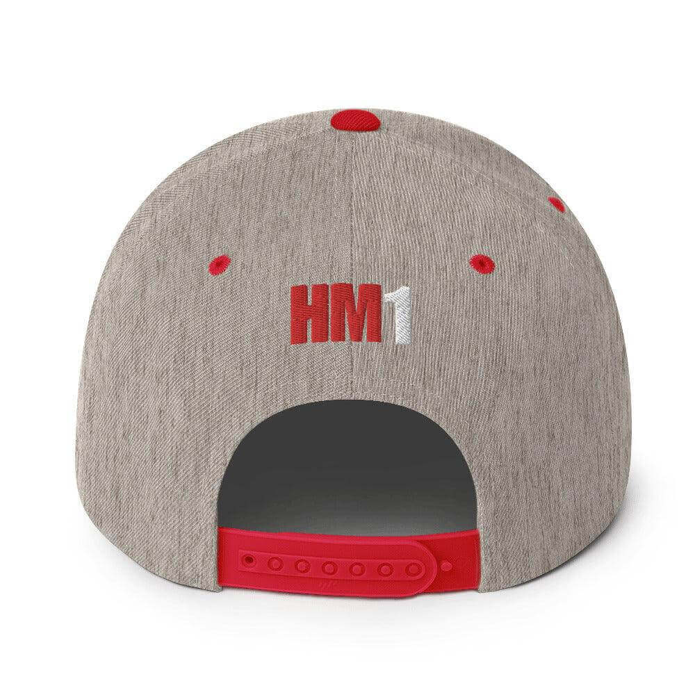 Back view of a structured snapback hat featuring 'HM1' embroidery and a red snap closure, perfect for firefighter gear.