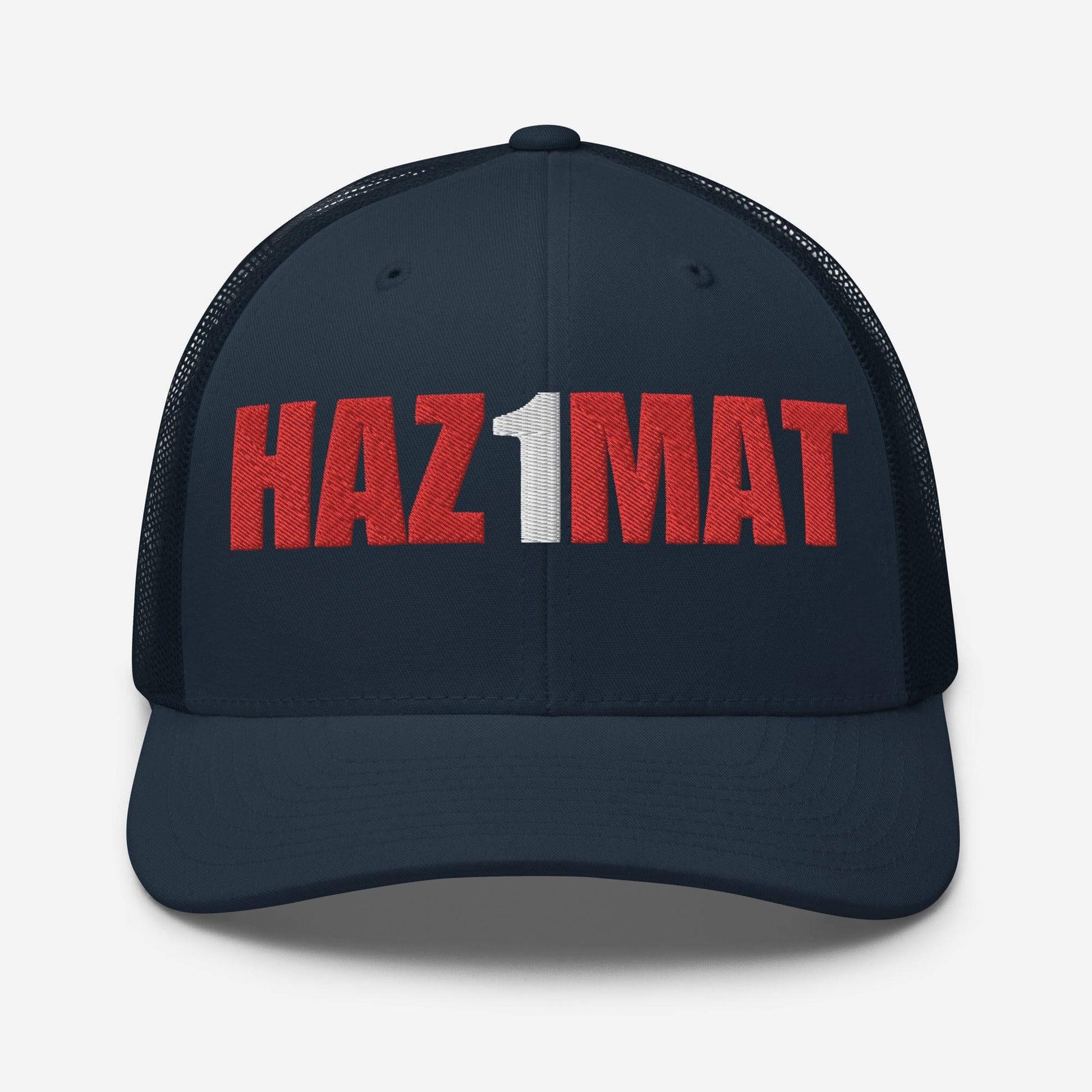 Navy trucker cap with "HAZ1MAT" embroidered in bold red and white, ideal for firefighters and safety apparel.