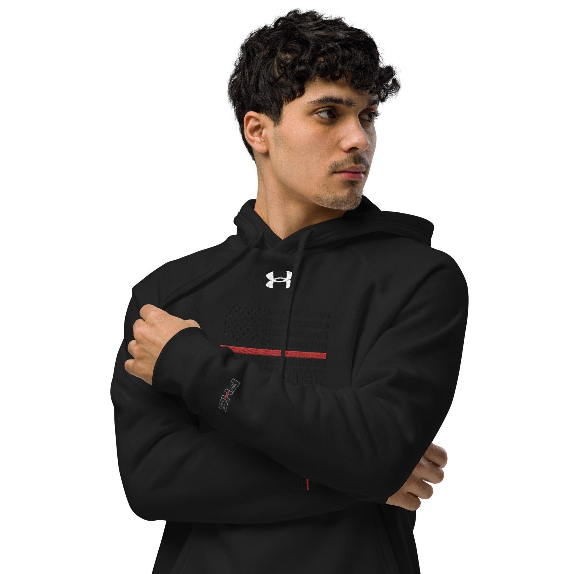 Black Under Armour hoodie worn by a model, ideal for firefighters and firehouse gifts, showcasing premium quality and comfort.