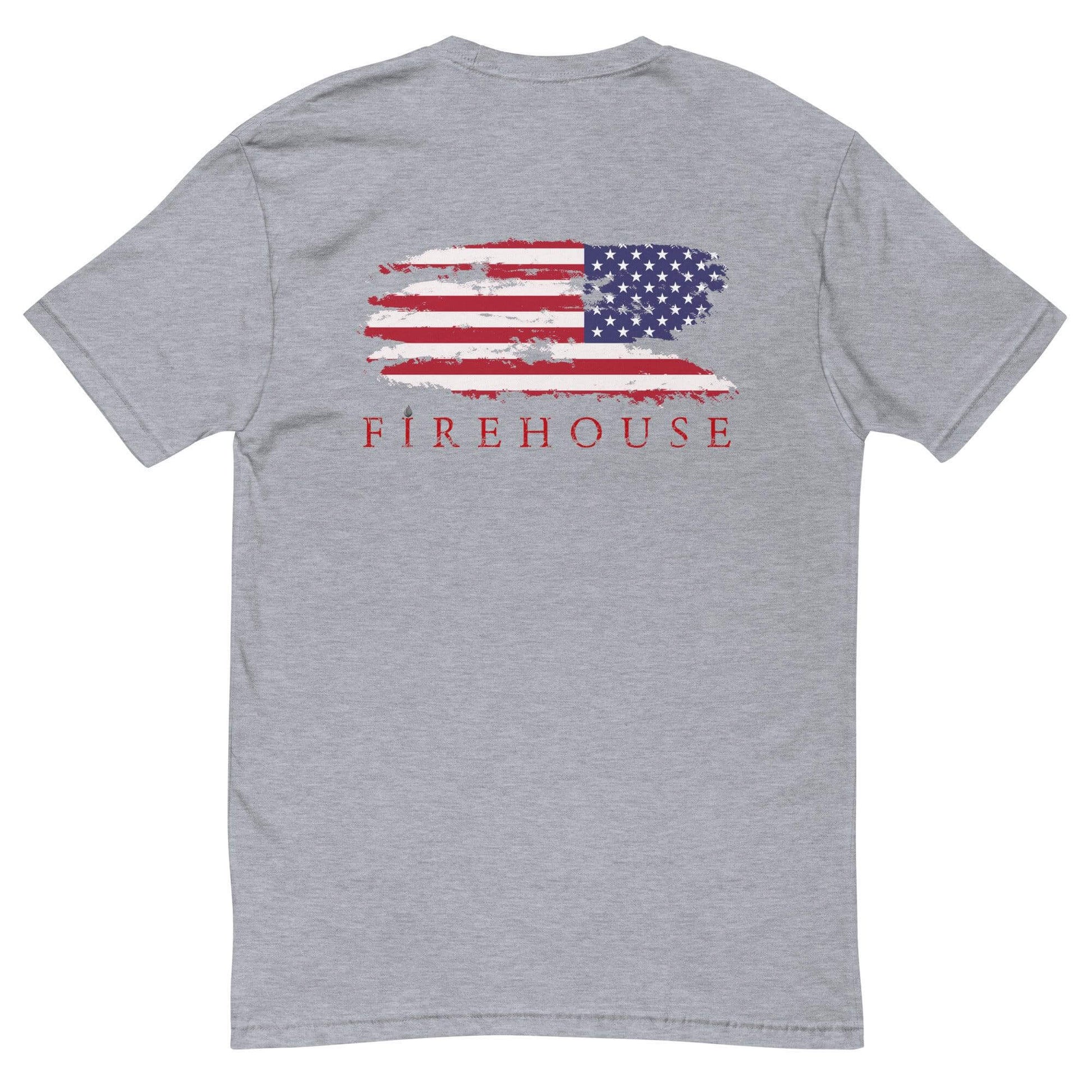 Grey short sleeve t-shirt featuring a distressed American flag and "FIREHOUSE" graphic on the back, perfect for firefighter apparel.