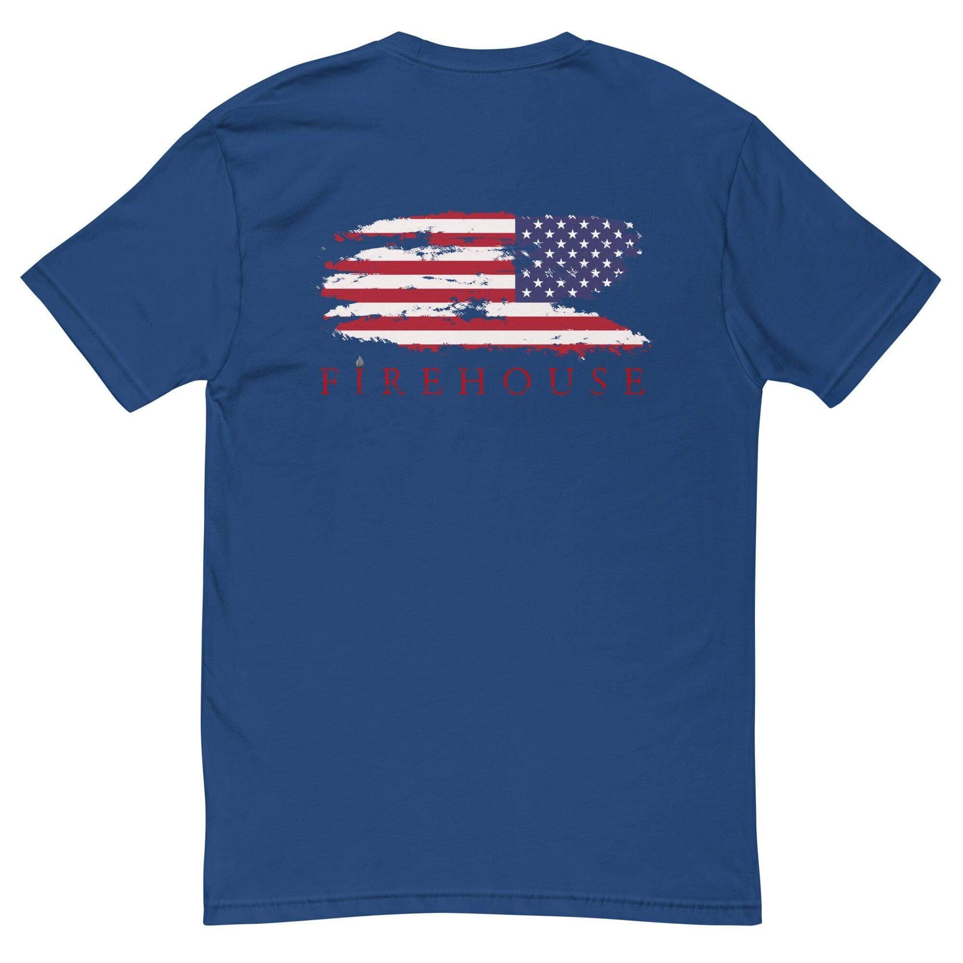 Navy blue t-shirt featuring a distressed American flag and "FIREHOUSE" text, perfect for firefighter gear and gifts.