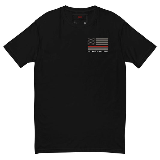 Black short sleeve t-shirt featuring a firehouse graphic and American flag, perfect for firefighter apparel and gifts.