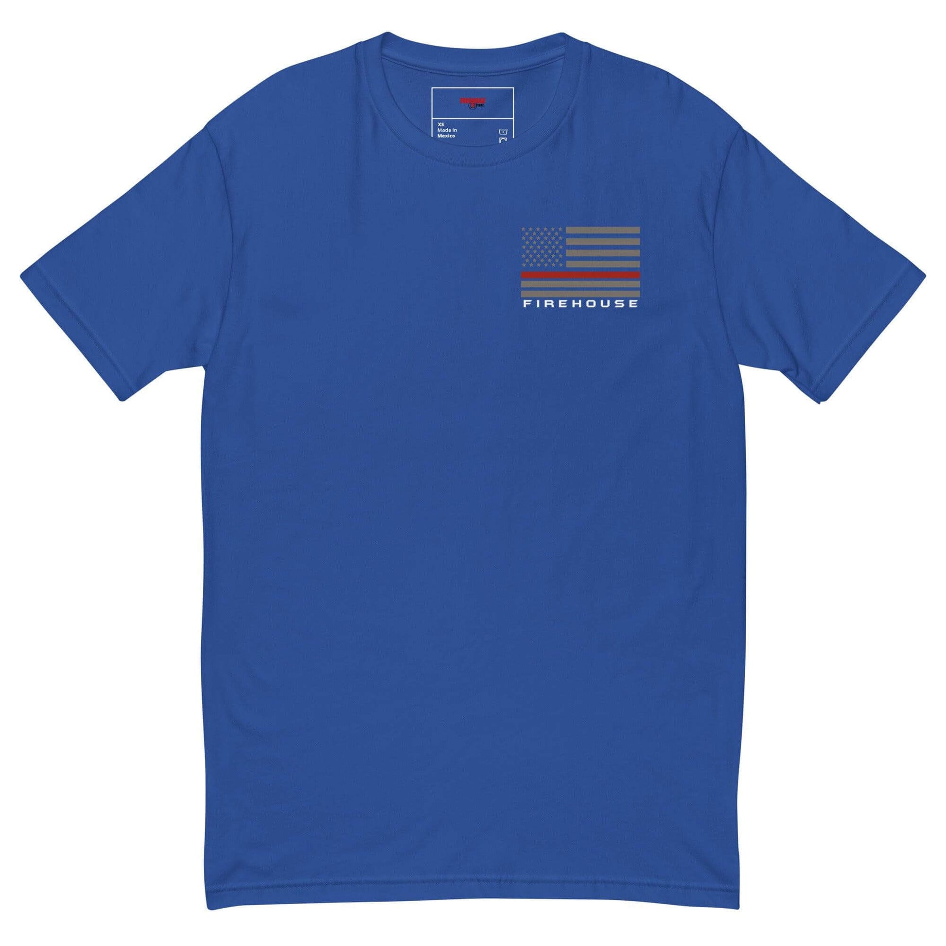 Blue short sleeve t-shirt featuring a firehouse graphic and American flag, perfect for firefighter apparel and gifts.