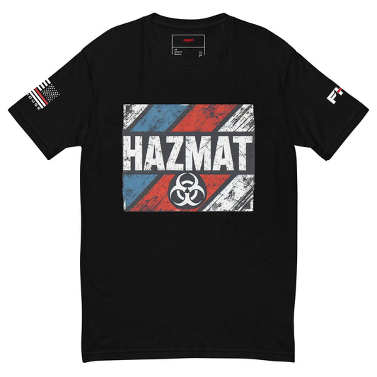 Black t-shirt featuring a distressed "HAZMAT" graphic with biohazard symbol and flag details, perfect for firefighters and first responders.