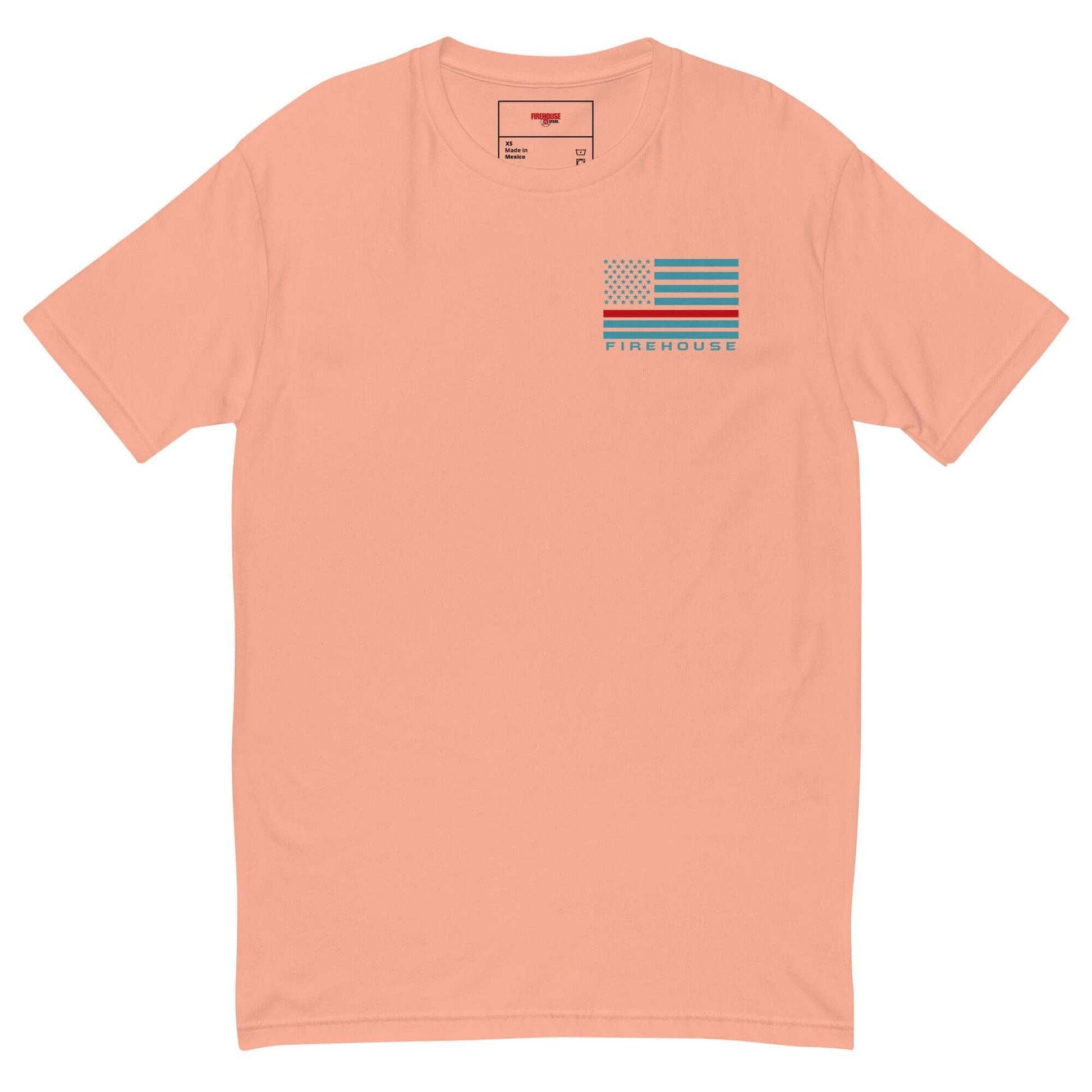 Short sleeve firehouse t-shirt in peach with flag design, ideal firefighter apparel and gifts for fire department enthusiasts.