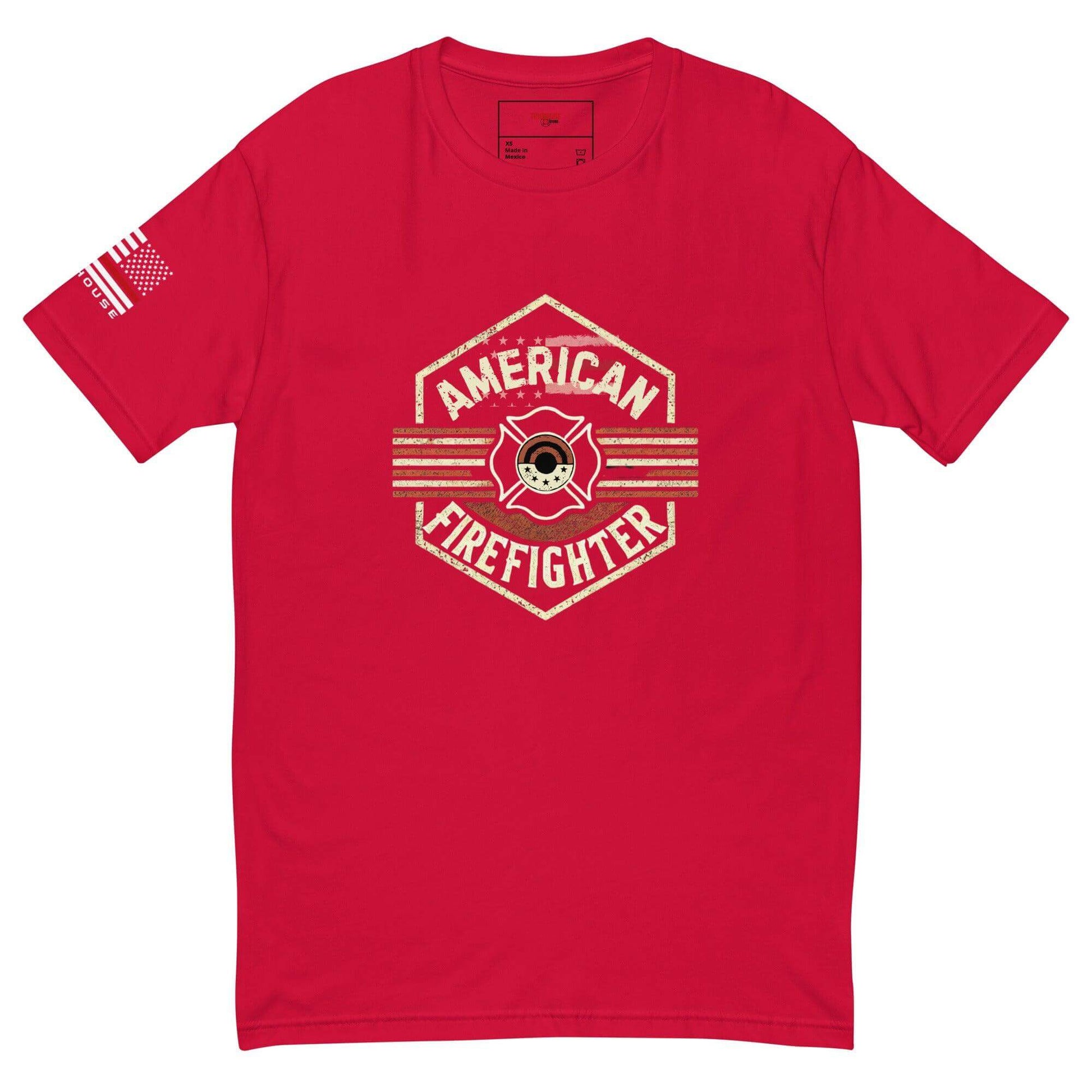 Red short sleeve t-shirt featuring "American Firefighter" graphic and flag design, perfect for firefighter apparel and gifts.