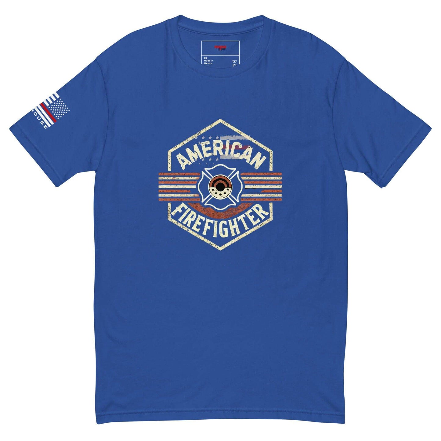 Blue short sleeve t-shirt featuring an "American Firefighter" graphic and flag emblem, perfect for firefighter apparel.